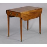 A Regency inlaid-mahogany pembroke table with rounded corners to the drop-leaves, fitted one end