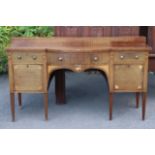 A 19th century inlaid-mahogany sideboard, fitted with a central frieze drawer flanked by a shallow &