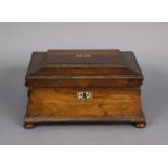 A Victorian rosewood work box of sarcophagus form, with beaded edges & ring side handles, fitted