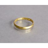 A 22ct gold wedding band, size K, 2.3g.