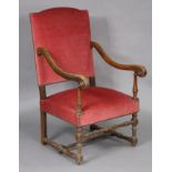 A Victorian mahogany frame large elbow chair with square padded back & seat upholstered rose pink