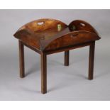 A 19th century mahogany butler’s tray-on-stand with hinged sides, on square chamfered legs, 27½” wid