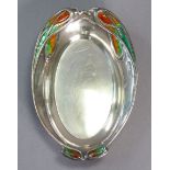 An Edwardian silver & enamel Art Nouveau style shaped oval dish, the raised rim with interlaced loop