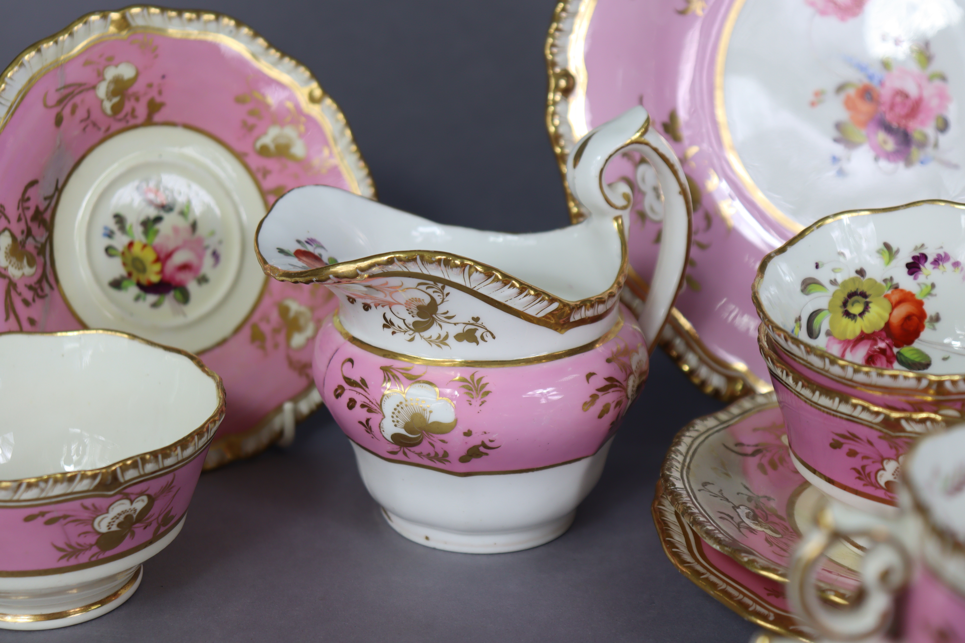 A 19th century English porcelain part tea & coffee service of pink ground with gilt banding & floral - Image 4 of 15