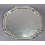 A George V silver square salver with re-entrant corners & raised moulded border, 13½” wide,