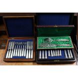 A pair of plated French fish servers with pierced & engraved blades, & loaded .950 standard neo-
