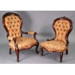 A Victorian-style mahogany frame easy chair with buttoned back, padded seat & arms, on short