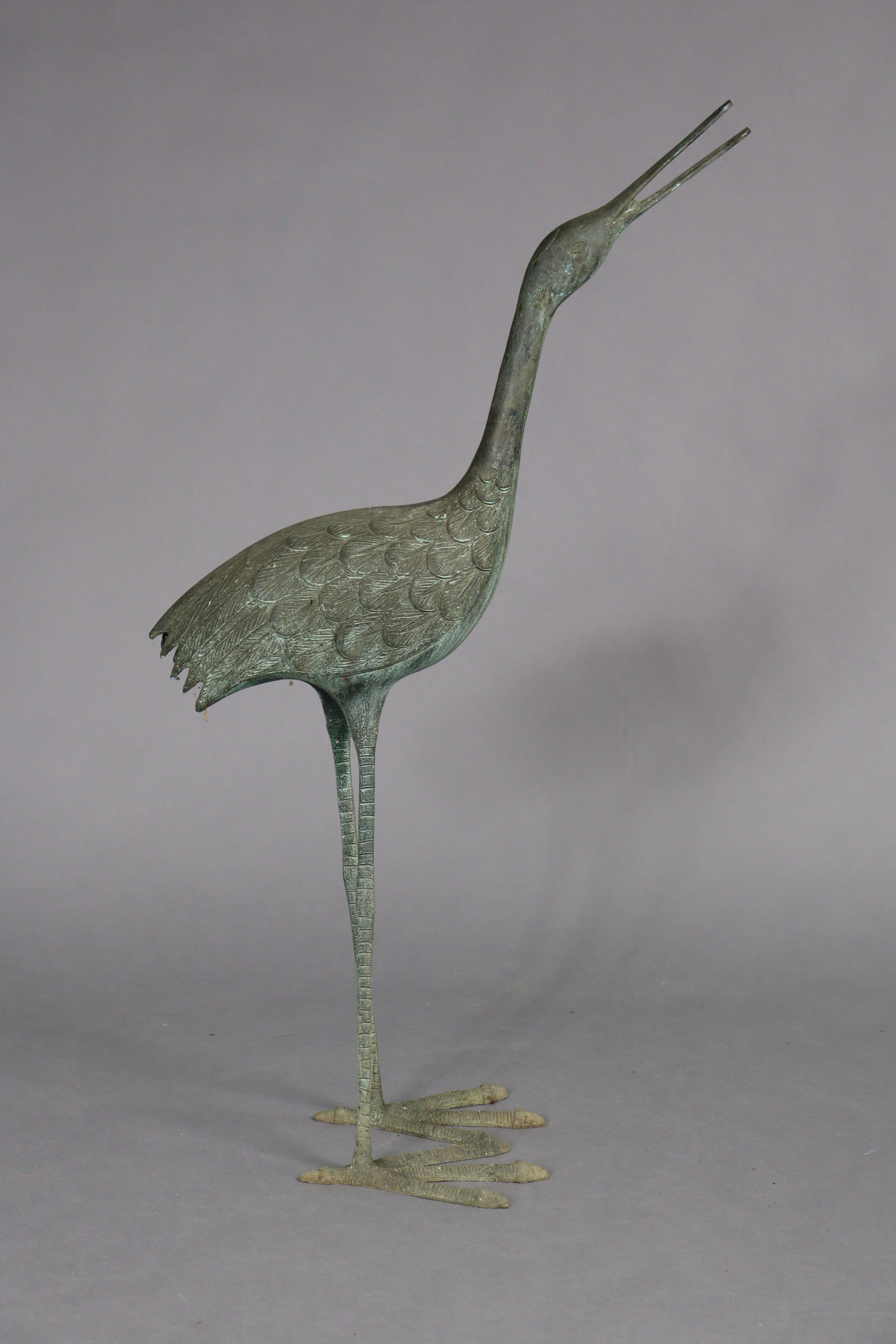 A pair of 20th century metal garden ornaments in the form of standing crane, 35” & 23” high. - Bild 3 aus 3