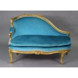 A Victorian giltwood chaise longue of small proportions, with carved shell-scroll & foliate