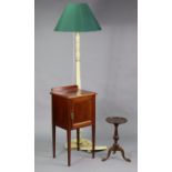 An Edwardian inlaid-mahogany bedside cupboard enclosed by a panel door, & on square tapered legs,
