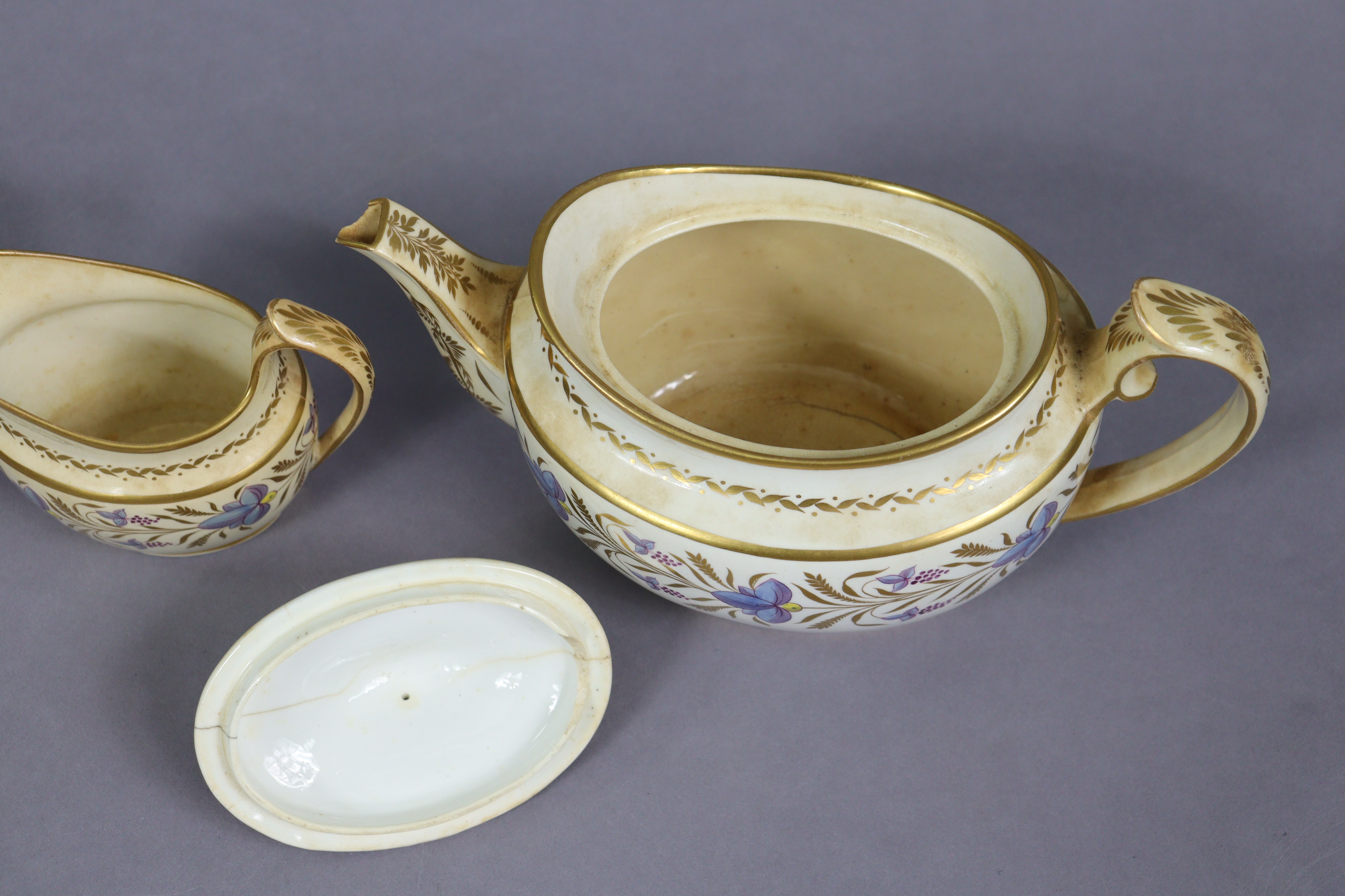 An early 19th century English porcelain thirty-nine piece part tea-coffee service with floral & gilt - Image 9 of 13