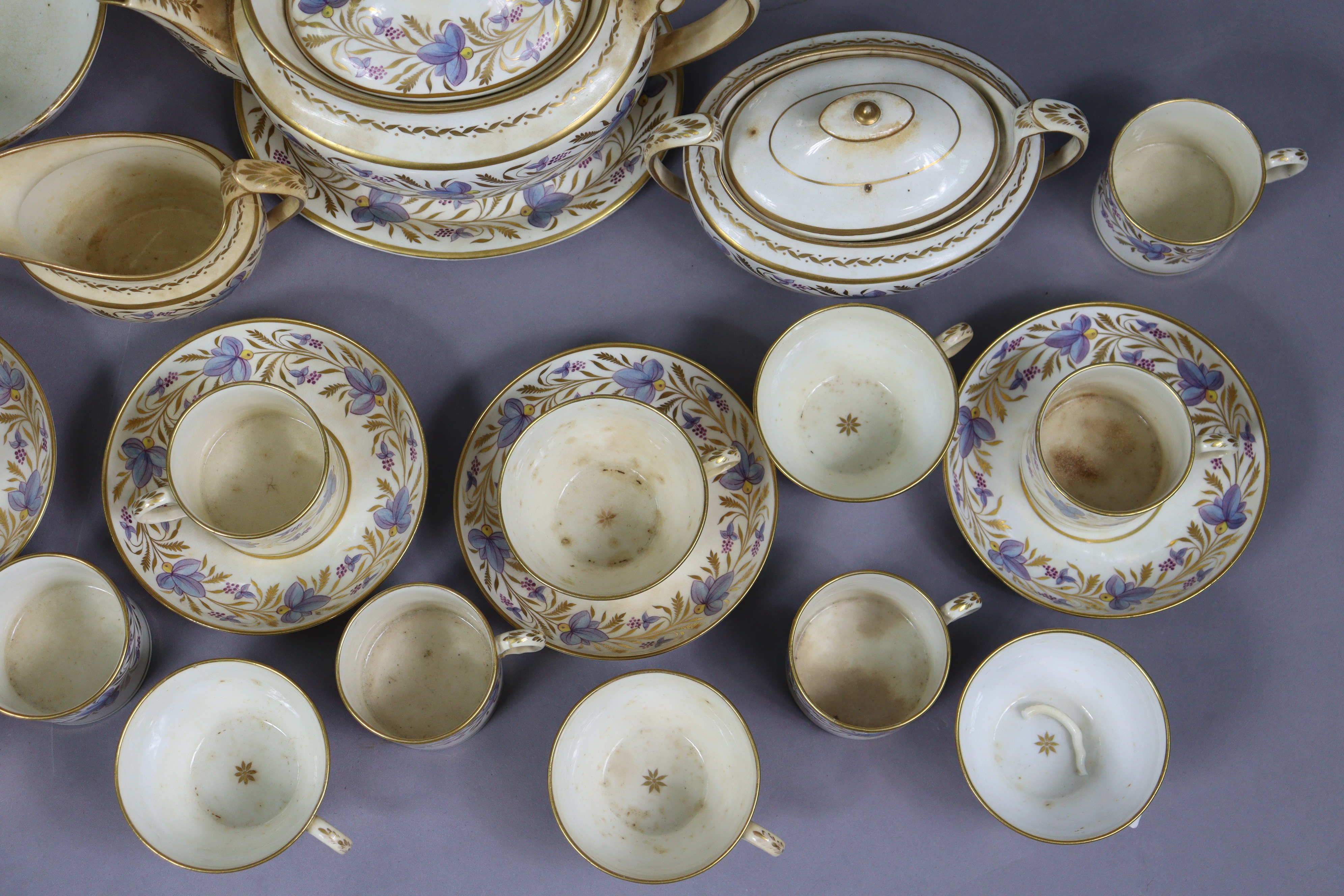 An early 19th century English porcelain thirty-nine piece part tea-coffee service with floral & gilt - Image 3 of 13