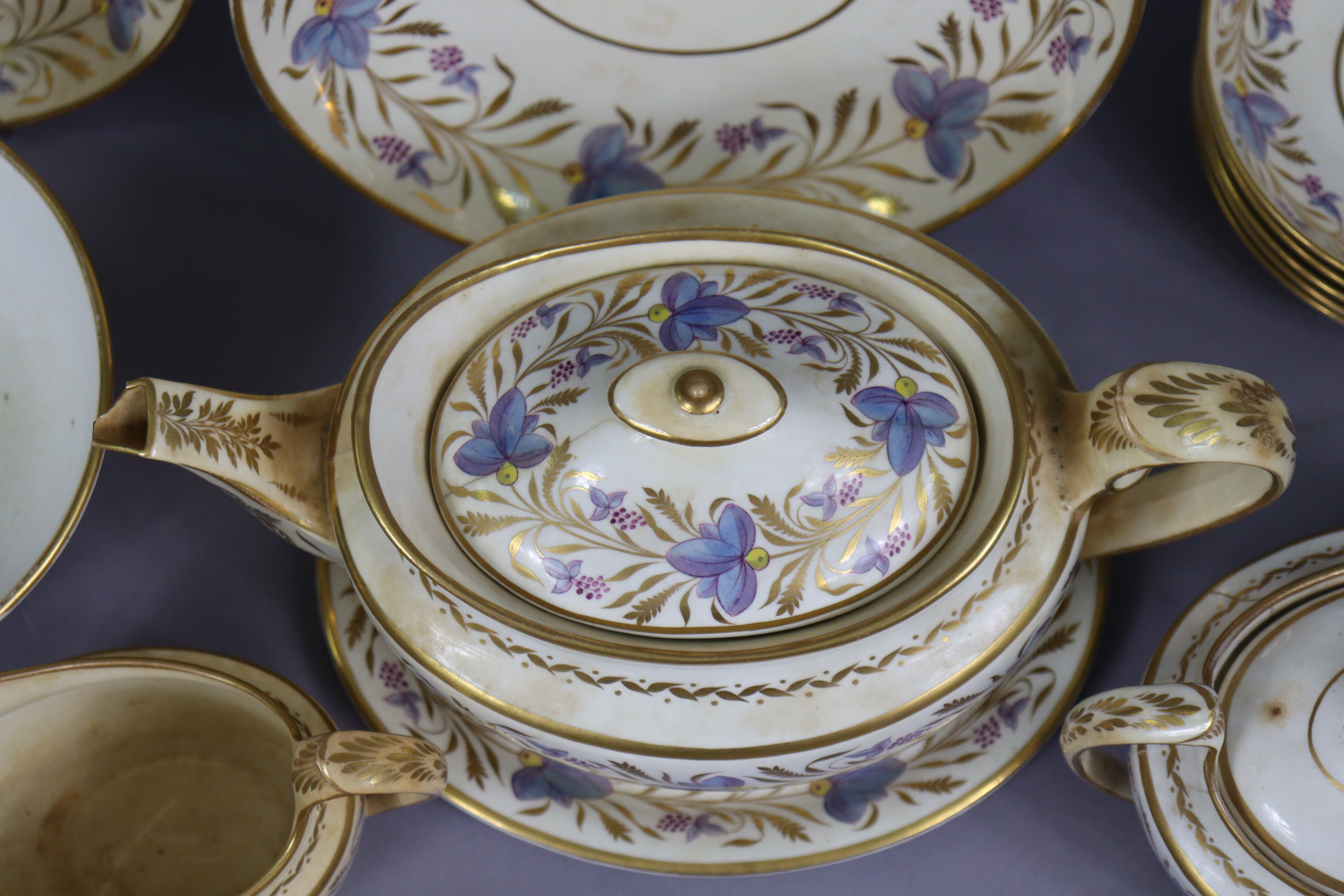 An early 19th century English porcelain thirty-nine piece part tea-coffee service with floral & gilt - Image 4 of 13