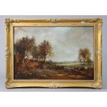 A large rural landscape (oil on canvas), signed indistinctly, 20" x 30", in a gilt frame.