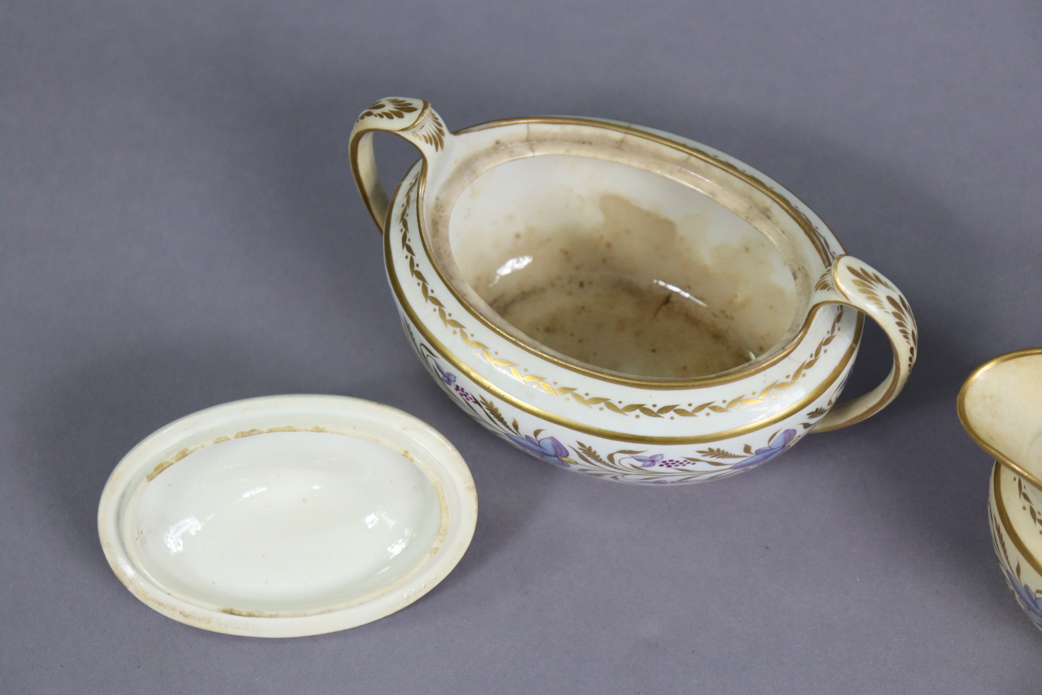 An early 19th century English porcelain thirty-nine piece part tea-coffee service with floral & gilt - Image 10 of 13
