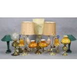Twelve various table lamps.