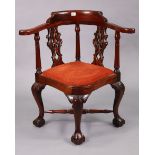 A 19th century-style hardwood splat-back corner chair with a padded seat, & on cabriole legs &