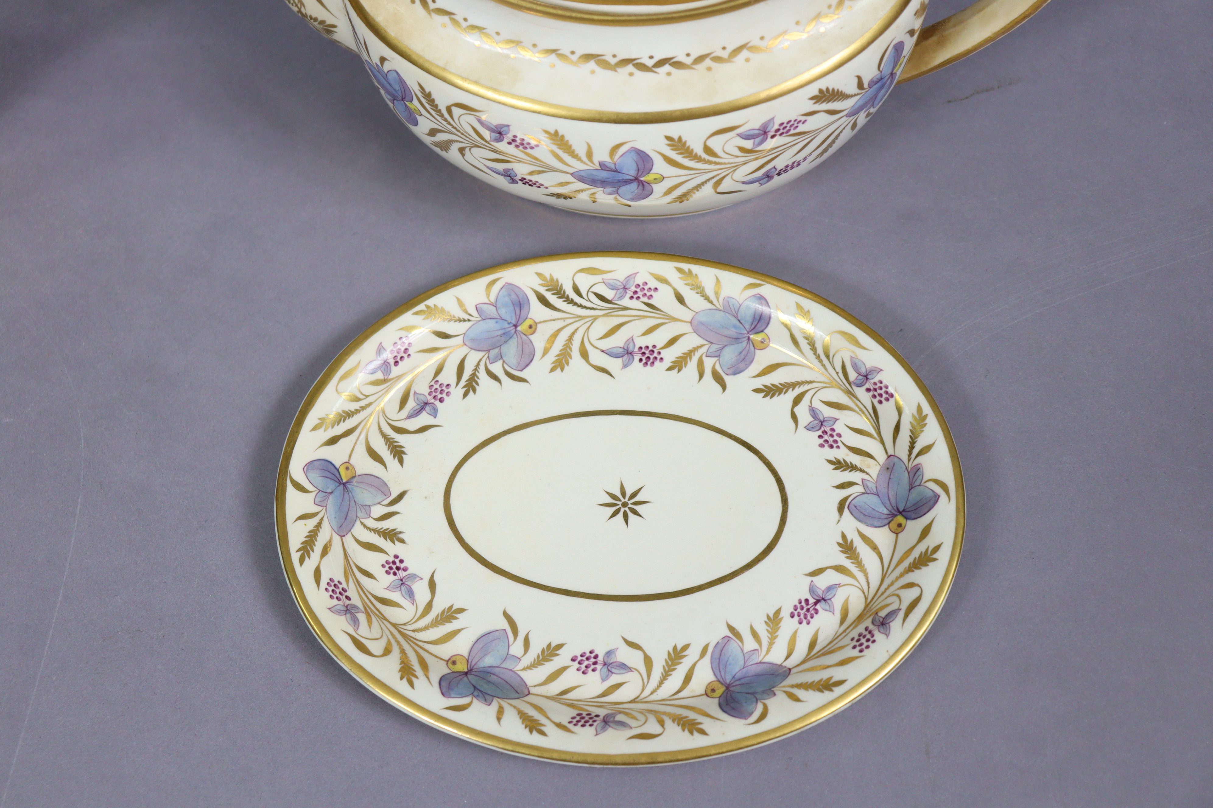 An early 19th century English porcelain thirty-nine piece part tea-coffee service with floral & gilt - Image 12 of 13