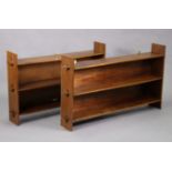 Two oak three-tier standing open bookcases, 52” high x 47” wide.