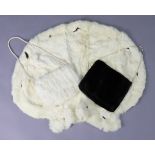 A white rabbit fur stole; & two fur hand-warmers/muffs