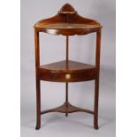 A 19th century-style mahogany bow-front two-tier corner washstand fitted drawer to the lower tier, &