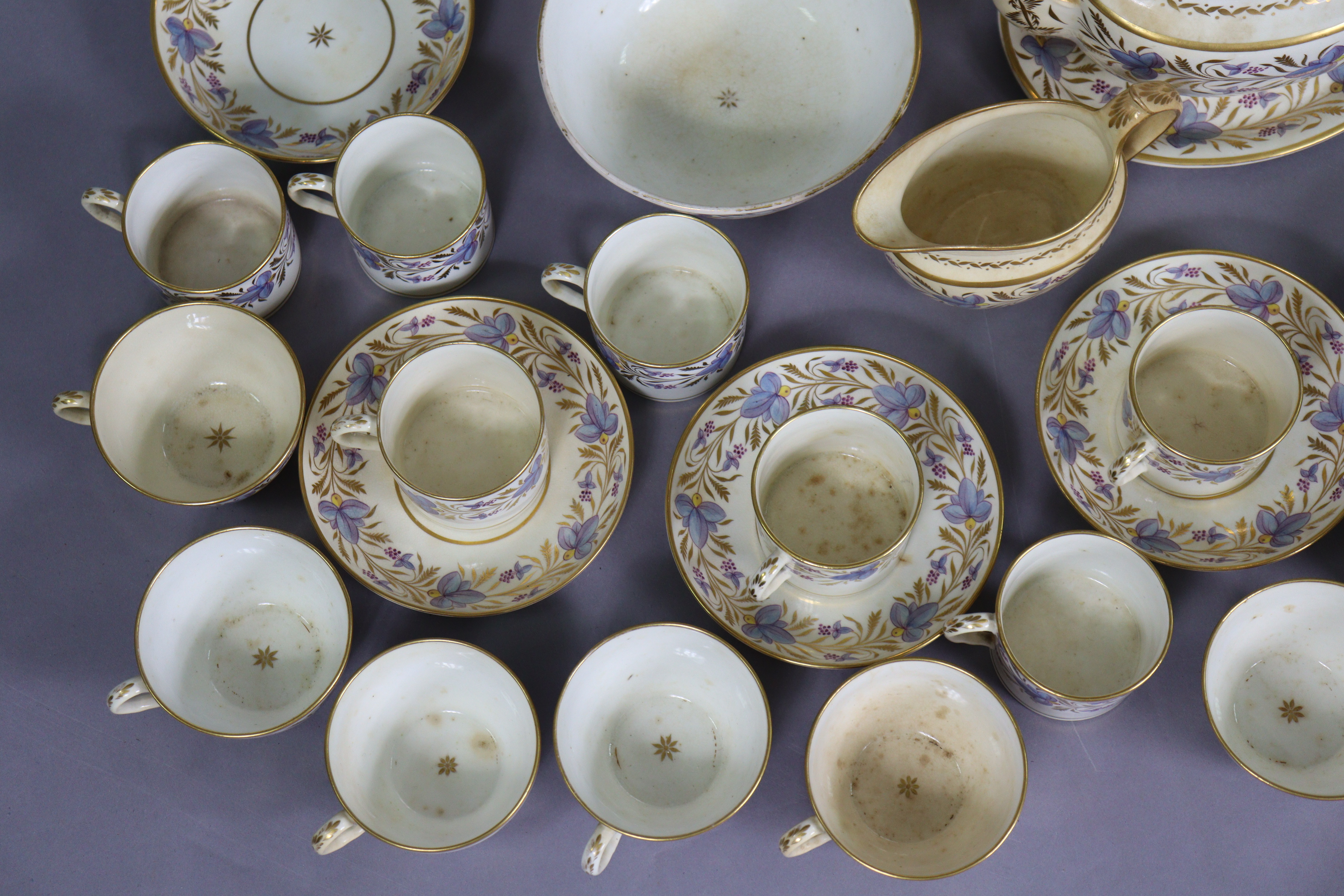 An early 19th century English porcelain thirty-nine piece part tea-coffee service with floral & gilt - Image 2 of 13