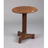 A 19th century mahogany apprentice-piece miniature tripod table with a circular tilt-top, & on a