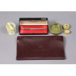 A Parker pen in original case, a red leatherette wallet “Westminster Bank Limited”, two small gilt-