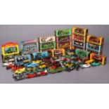 A collection of approximately fifty various die-cast scale model vehicles, boxed & un-boxed.
