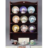 A set of twelve Coalport bone china coffee cups & saucers form “The Coalport Museum Historic