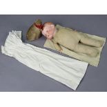 An Armand Marseille bisque-head baby doll (A. M.) with cloth body, 15” tall; & a cat cloth soft