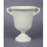 A Royal Worcester white-glazed vase in the form of a neo-classical urn, with scroll side handles,
