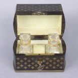 A 19th century ebonised & brass-inlaid scent bottle casket with repeating cruciform design to the