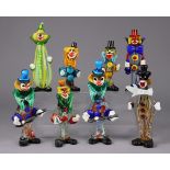 Eight various Murano glass clown ornaments, the larges 13½” high.