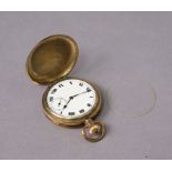 A vintage gent’s hunter pocket watch with black roman numerals to the white enamel dial, & in