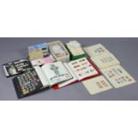 A collection of World stamps in two albums, on loose album leaves, & sorted into envelopes.