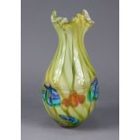 A Murano glass large baluster vase of pale green colour with foliate rim, 17¾” high.