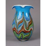 A Murano glass ovoid vase with over-turned rim & multicoloured design, 13” high.