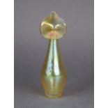 An iridescent glass vase of “Jack In the Pulpit” form, 8½” high, incised to base “Tiffany. Co. NY”.