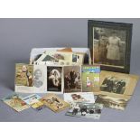 Approximately fifty various loose postcards & family photographs.