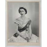 AN AUTOGRAPHED PHOTOGRAPHIC PORTAIT OF QUEEN ELIZABETH II, taken by Dorothy Wilding, signed &