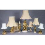 Seven continental-style table lamp bases, each with shade.