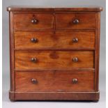 A Victorian mahogany chest fitted two short & three long graduated drawers with turned knob holes, &