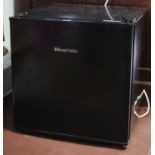 A Russell Hobbs counter-top refrigerator in a black-finish metal case, 18½” wide x 18½” high.