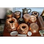 Seven copper jelly moulds; an oak tea barrel; various advertising tins; & sundry other items.