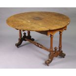 A 19th century birds-eye-maple circular drop-leaf dining table on pair of turned supports to
