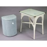 A white painted loom rectangular occasional table on four legs with diagonal stretchers 28¼” wide