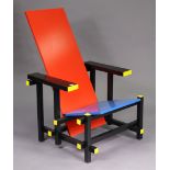A ‘red & blue’ chair after the design by Gerrit Rietveld, of wooden construction with removable seat