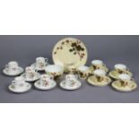A set of six Royal Worcester bone china “Roanoke” coffee cans and saucers, and a Limoges floral