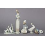 Five various Lladro porcelain ornaments.